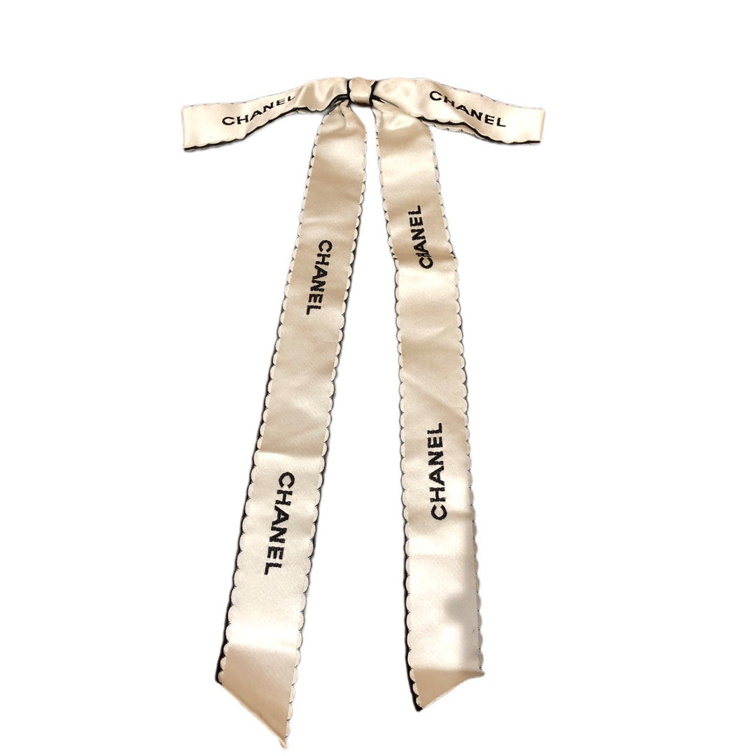 * Chanel Ribbon Brooch