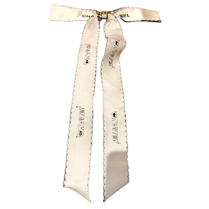 * Chanel Ribbon Brooch