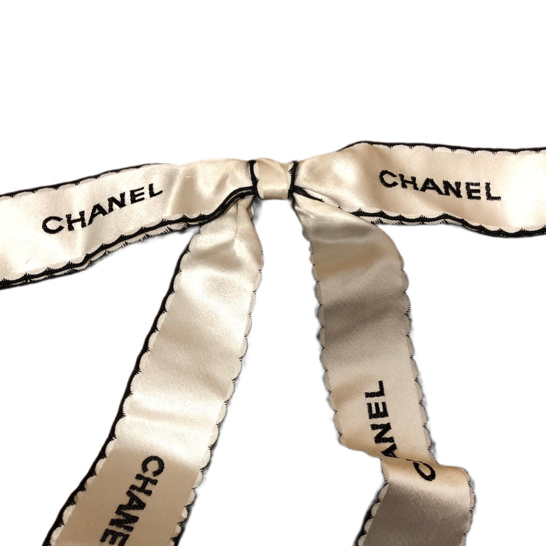 * Chanel Ribbon Brooch